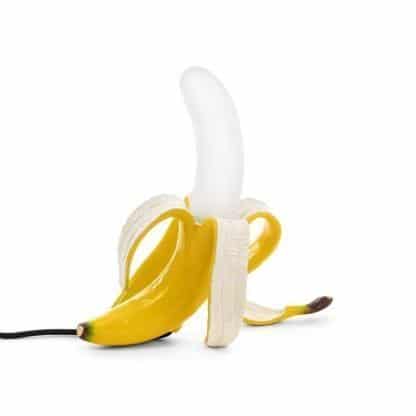 Seletti lampada a led con regolazione di intensità di luce che riproduce una banana sbucciata per metà